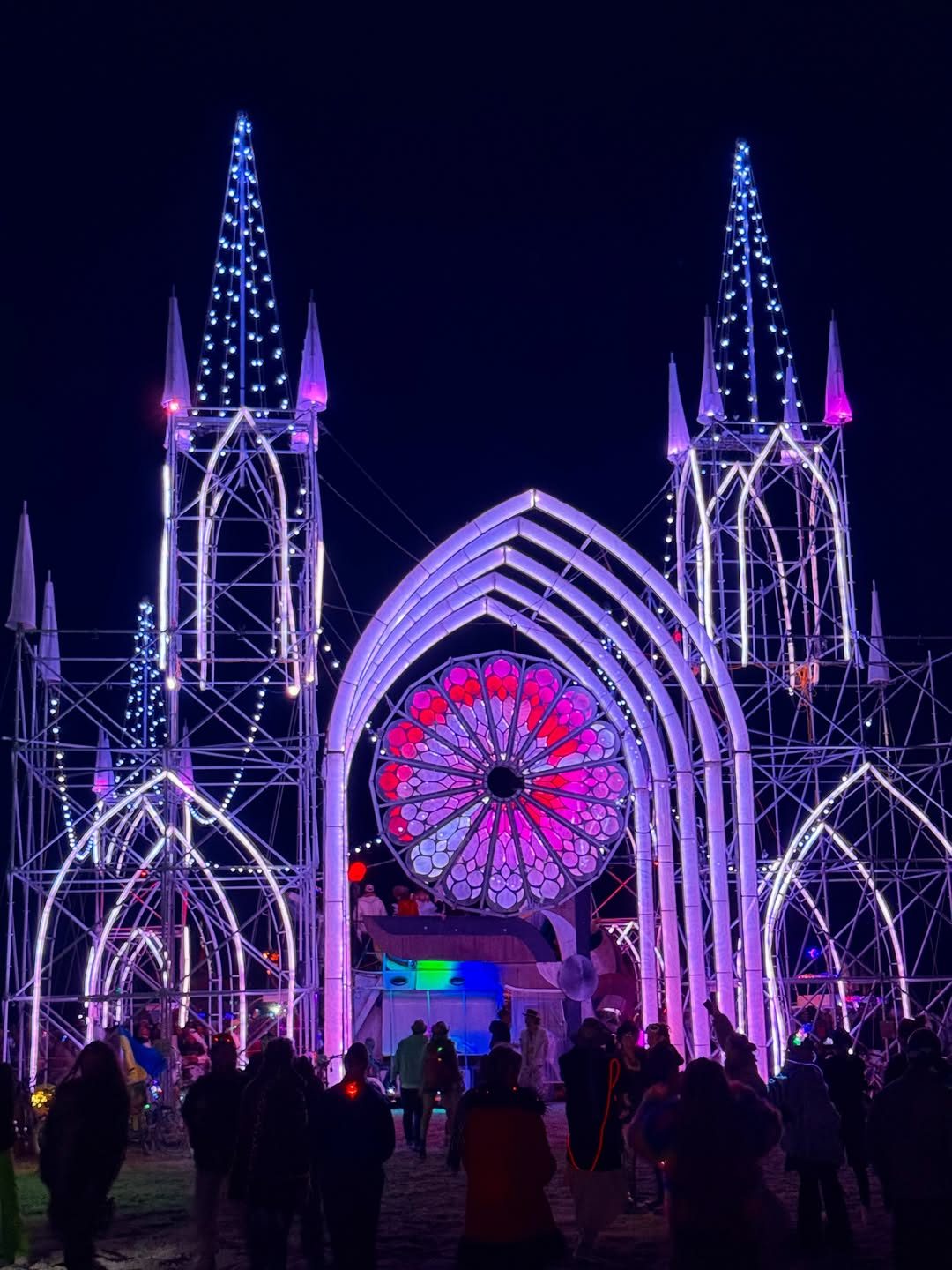 Illuminated art structure at night, Burning Man